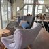 Active Life Madarao in Iiyama: cozy lounge chairs beside large windows overlooking snowy slopes
