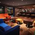 Hotel Zugbrücke Grenzau lounge with colorful seating and bar area in Hohr Grenzhausen