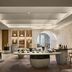Rosewood Guangzhou in Guangzhou: elegant hotel lounge with curved tables, displays, and archway to city view