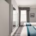 Cairn Hotel Newcastle Jesmond in Newcastle upon Tyne, twin room with patterned carpet and tall windows