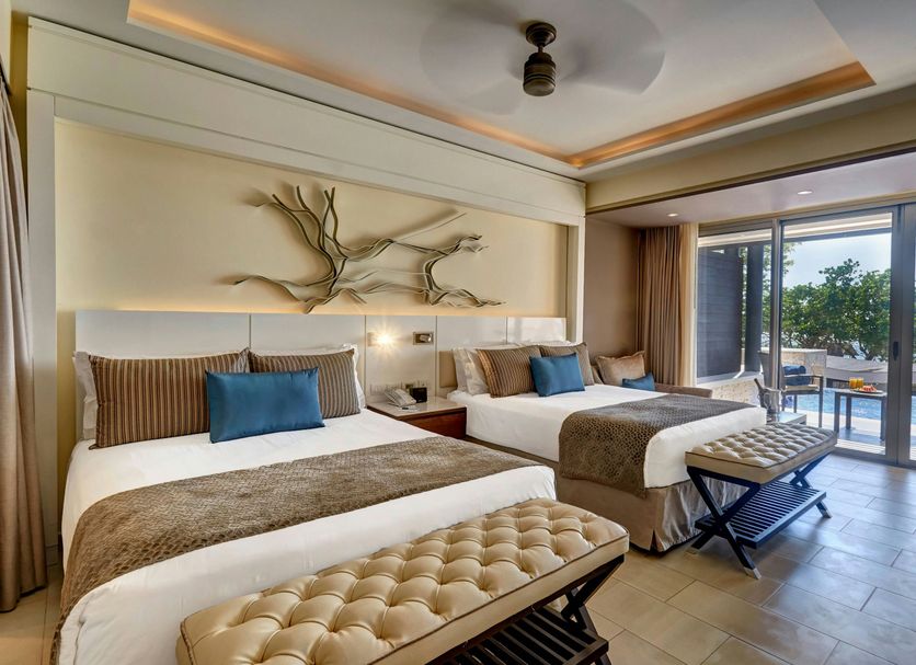 Grand Lido Negril Au-Naturel, An Autograph Collection Resort - Adults Only guest room with two beds and ocean view balcony