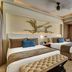 Grand Lido Negril Au-Naturel, An Autograph Collection Resort - Adults Only guest room with two beds and ocean view balcony