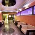Orsmaris Boutique Hotel in Marmaris lobby lounge with seating, polished floor and purple-lit windows