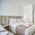 Hotel Praia Bonita Jatiúca in Maceió: bright double room with twin beds, desk, and air conditioning