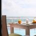 Dining table at Coral Rock By Bansei in Hikkaduwa with ocean view and breakfast setting