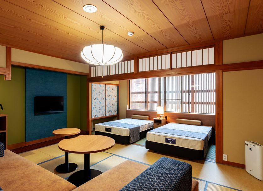 Kinosaki Onsen Kawaguchiya Honkan in Toyooka, tatami room with twin beds and seating area