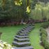 Hotel Spa La Central - Adults Only in Maçanet de Cabrenys, garden loungers beside a stream