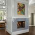 Homewood Suites by Hilton Atlanta - Alpharetta lobby with fireplace, dining tables, and vaulted ceilings