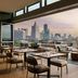 The Tess, Autograph Collection in Atlanta with skyline views from a rooftop terrace seating area