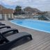 Studio Suite at Marina Cabo Plaza rooftop pool with marina and mountain views in Cabo San Lucas