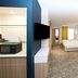 SpringHill Suites by Marriott Seattle Issaquah guest room with bed, desk, and TV in Issaquah