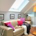 Abbey Manor Luxury Guesthouse in Cape Town: airy lounge with skylight, sofa, armchair and coffee table