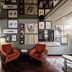 Mercure Hotel Pforzheim lobby with orange chairs, gallery wall art and wood flooring in Pforzheim