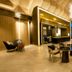 Le Méridien Khao Lak Resort & Spa lobby with modern seating and open-air ocean-view lounge in Khao Lak