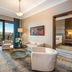 Çelik Palace Hotel Convention Center & Thermal Spa in Bursa, elegant suite with balcony view and seating area
