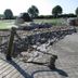 Hôtel Fleur de Lys Hazebrouck: mini-golf course with rocks, nets and wooden footbridge in Hazebrouck