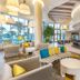 Club Wyndham Clearwater Beach lobby lounge with bar seating and bright beach views
