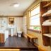 The Inn at Kippen bathroom in Stirling with walk-in tub, shower, toilet, and wood shelving
