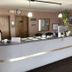Denison Inn & Suites front desk and reception area in Denison