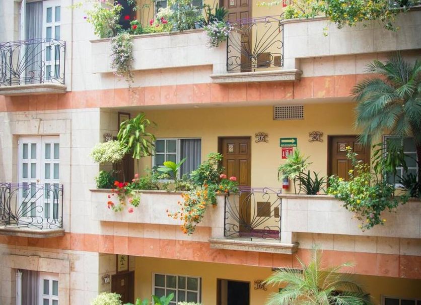 Hotel Santa Maria, Mexico City: exterior balconies with potted plants and flowers