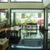 OYO 90151 Hill Inn Batu Caves lobby with seating, potted plants and large front windows