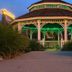 Amber's Inn & Suites in Wisconsin Dells with a lit gazebo-style entrance at dusk