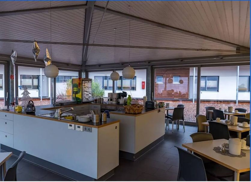 Arena Hotel Waldshut breakfast room with buffet tables and seating in Waldshut-Tiengen