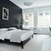Mint House at 70 Pine, New York: modern hotel room with bed, desk, and large windows