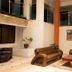 Constellation Hotel in Port Au Prince lobby with brown leather seating and high ceilings