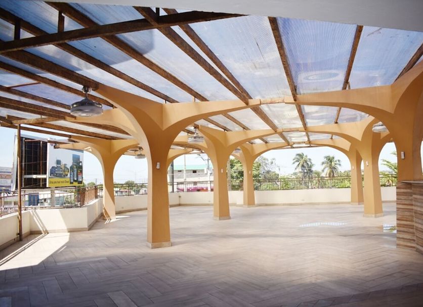 Constellation Hotel in Port Au Prince rooftop terrace with arched columns and city views