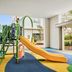 Oakwood Residence Saigon in Ho Chi Minh City features a colorful children’s playground with slide