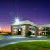 Red Roof Inn Kenly - I-95 exterior at dusk with illuminated entrance and parking lot