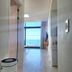 Jeju Oda Pension hallway to ocean-view room with balcony in Jeju City