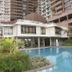Home Edge Accommodations @ Tivoli Garden Residences, Manila: outdoor pool beside high-rise buildings