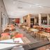 Holiday Inn Express Nürnberg-Schwabach restaurant dining area in Schwabach with tables and chairs