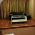 Huiquan Boutique Hotel in Jinan guest lounge with sofa, coffee table and gold curtains