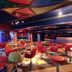 Park Hotel Tyrrenian in Amantea, colorful lounge bar with red seating and checkerboard floor