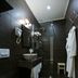 Garni Hotel Zen free parking bathroom in Niš with walk-in shower, vessel sink and wall-mounted toilet