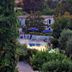 Hotel Parco Conte in Casamicciola Terme with an outdoor pool and garden surrounded by greenery
