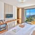 Samira Resort Hotel Aparts & Villas in Kalkan guest room with sea view balcony and king bed