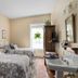The Stagecoach Inn Bed & Breakfast and Five20 Social Stop guest room in Cedarburg with two twin beds and window view
