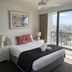 Royal Palm Resort in Palm Beach bedroom with balcony and city views