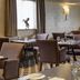 Best Western Heath Court Hotel, Newmarket dining room with set tables and upholstered chairs