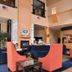 Comfort Suites Airport Tukwila Seattle lobby with seating area and front desk in Tukwila