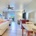 La Fiesta Ocean Inn And Suites in St. Augustine guest room with two beds, TV, and patio doors