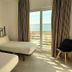 Hotel Mediterráneo by Croma in Estepona guest room with twin beds and balcony sea view