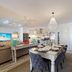 Bel Azur Beach Residence With Lov in Trou Aux Biches: open-plan suite with dining table and sofa