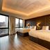 The Shankly Hotel Liverpool guest room with two beds, city views and floor-to-ceiling windows