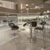 Inntu Hotel Medellín lobby lounge with modern seating and reflective marble floors