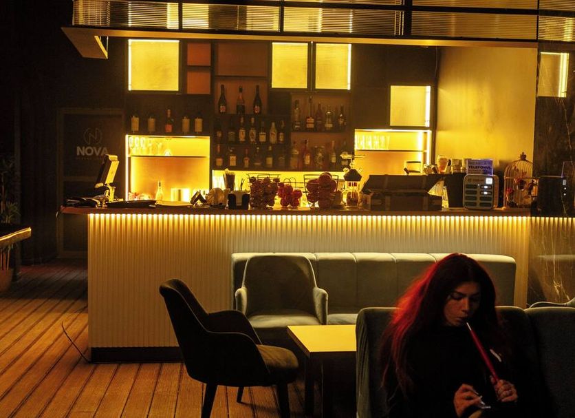 Villa Boutique Lafayette Bucharest bar lounge with backlit counter and seating